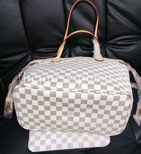 spot fake louis vuitton neverfull damier ebene|false louis vuitton neverfull.